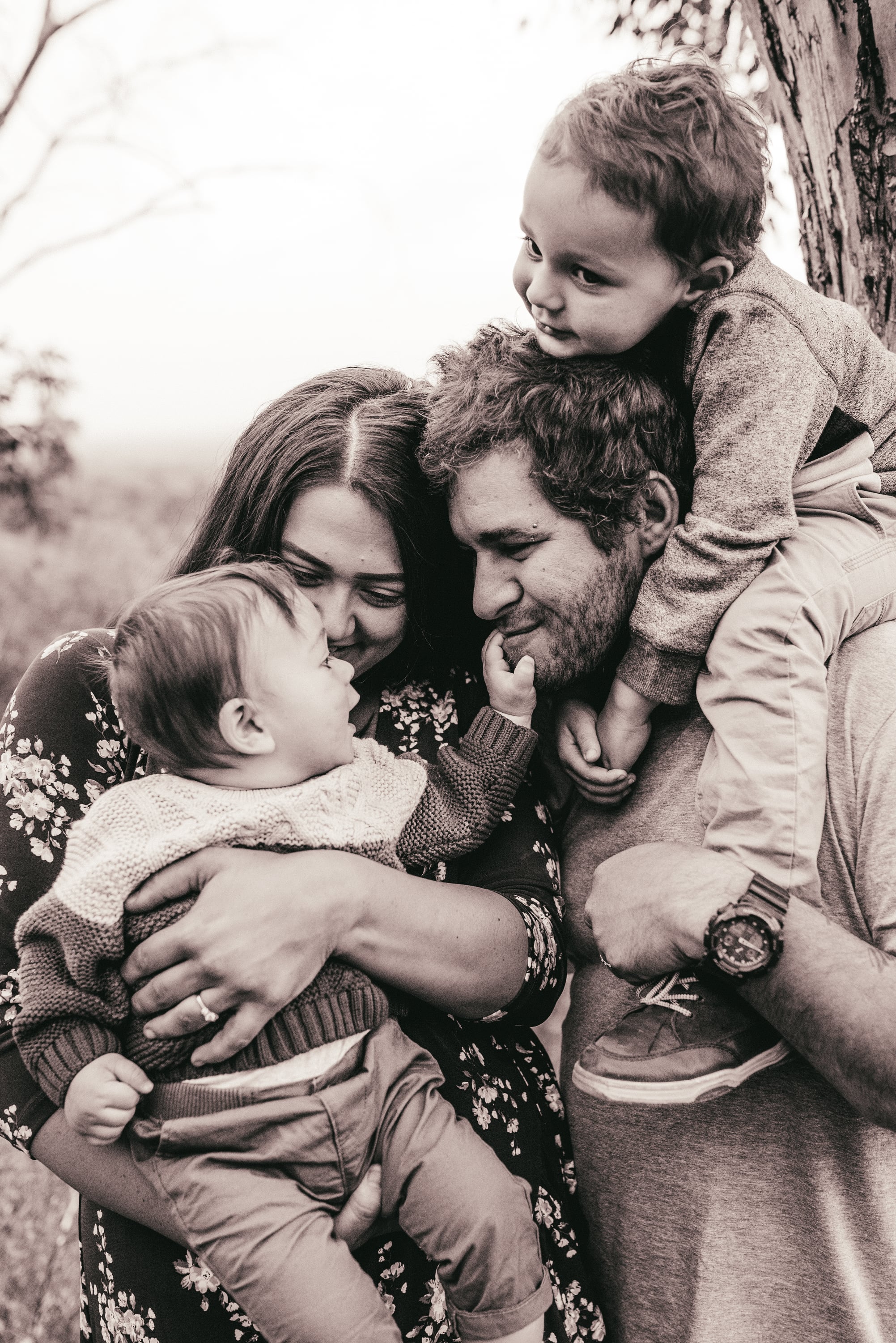 A family playing together, soft and unposed